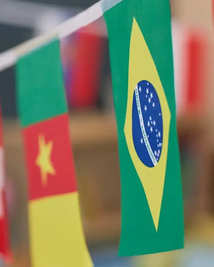 flags hanging on a wall