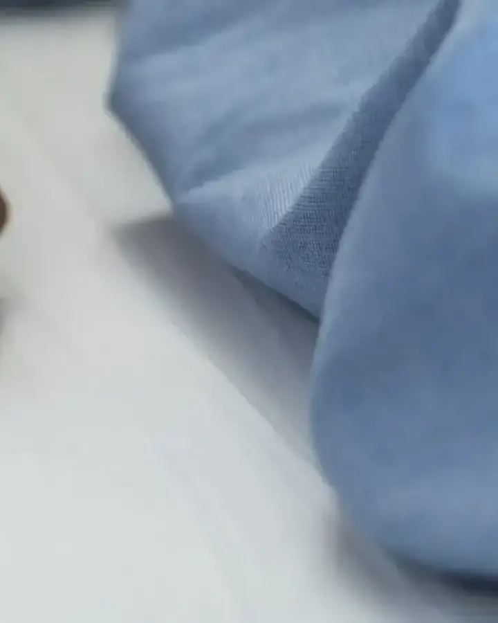 person holding patient's hand