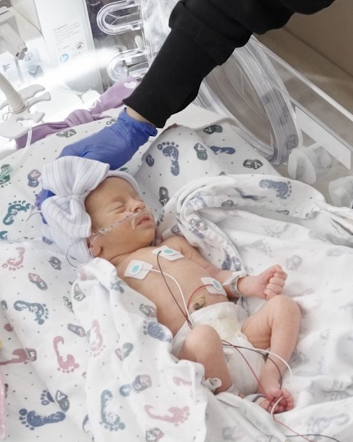 Nurse-attending-to-baby-in-an-incubator