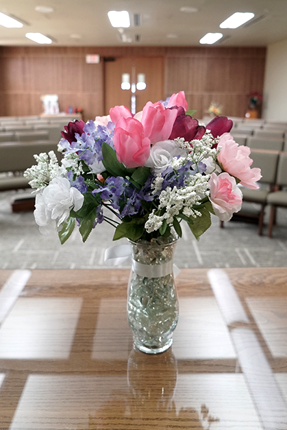 flowers-on-table-in-a-chapel