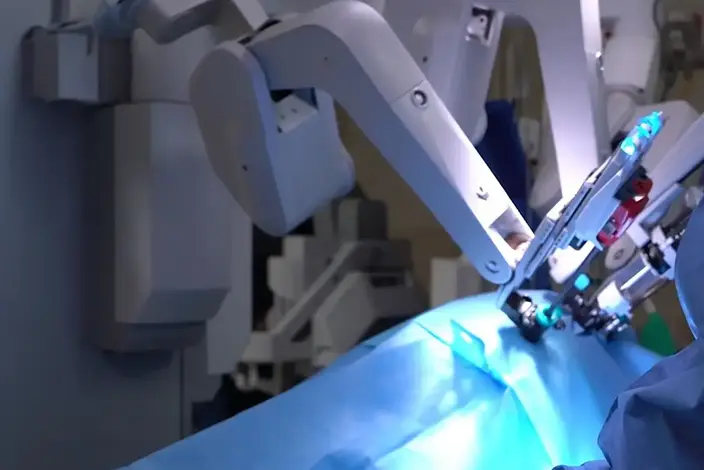 a surgeon operating a patient in a hospital