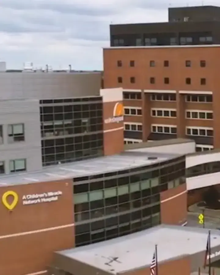 a view of a city with buildings and a clock