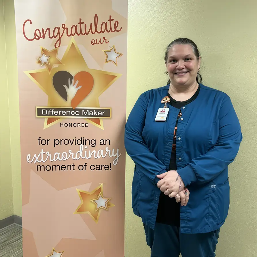 suzanne-echols-with-sunshine-award