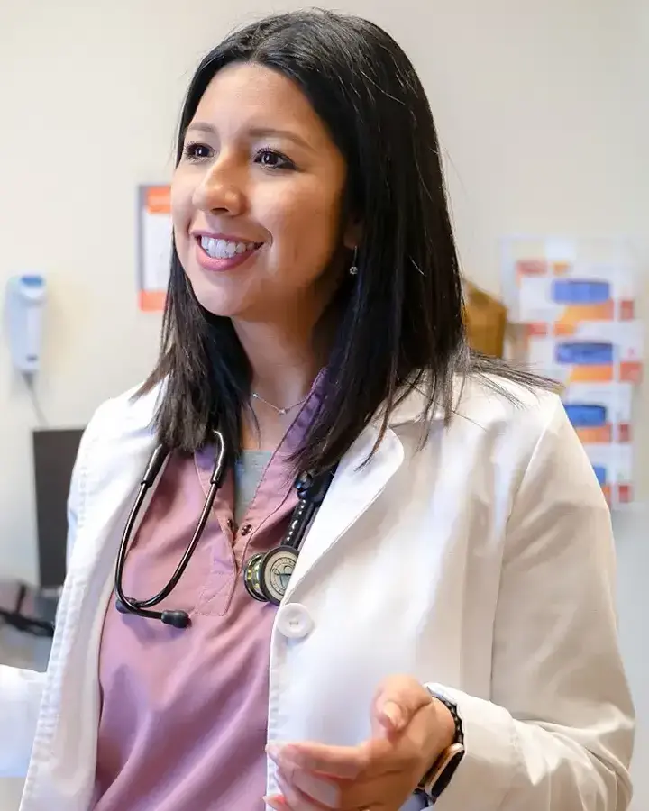 a woman talking to a doctor